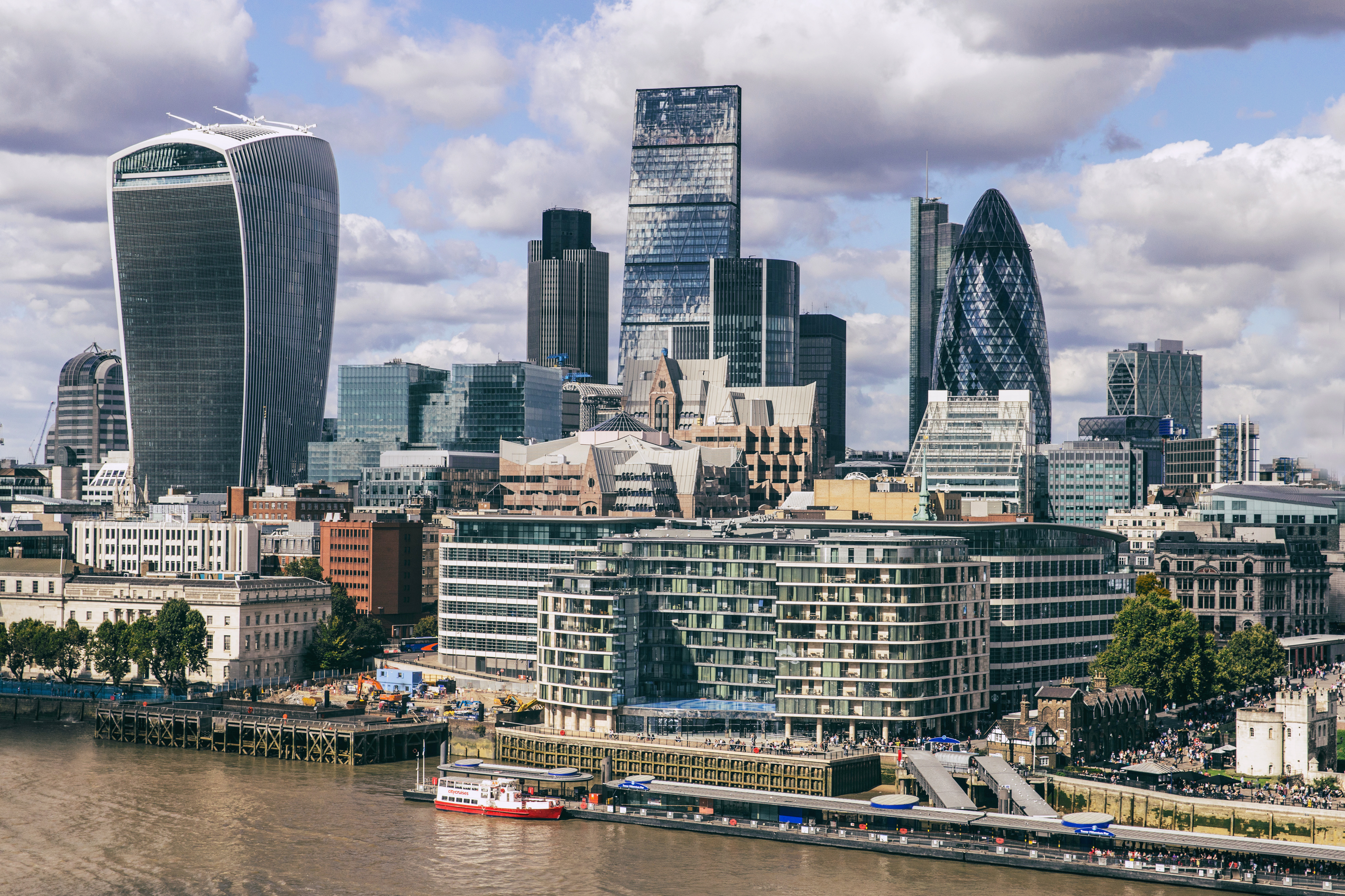 A skyline, with a mixture of skyscrapers, of the London Southbank, showing the Gherkin, the Walkie Talkie building and the Cheesegrater.